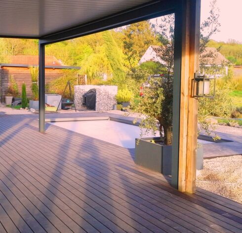 terrasse plage de piscine en rez de pelouse Authume 39 installation